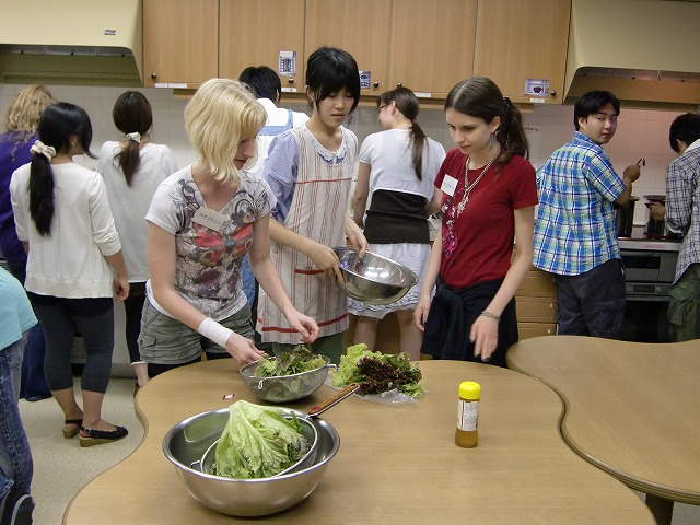 Washing the greens for the salad.