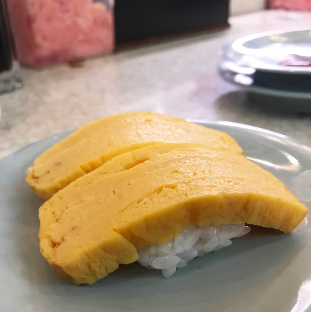 Tamagoyaki is a sweet and fluffy scrambled egg slice, usually lain over rice.